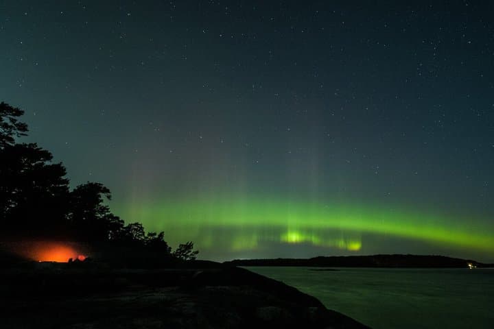 Stockholm: Ice Skating with fire & chance of Northern Lights