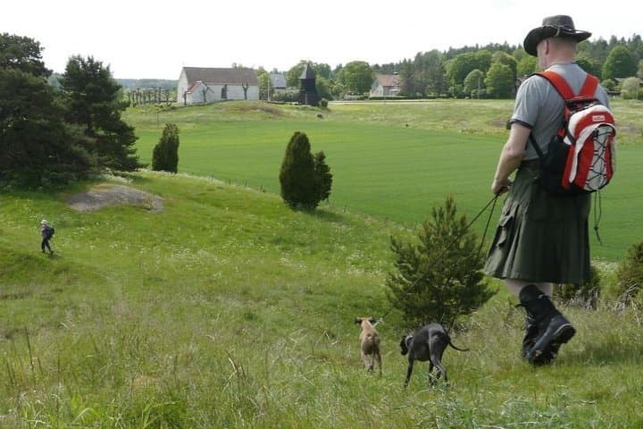Vada church (background), taken from the grave mounds of Vada Sjökullar.