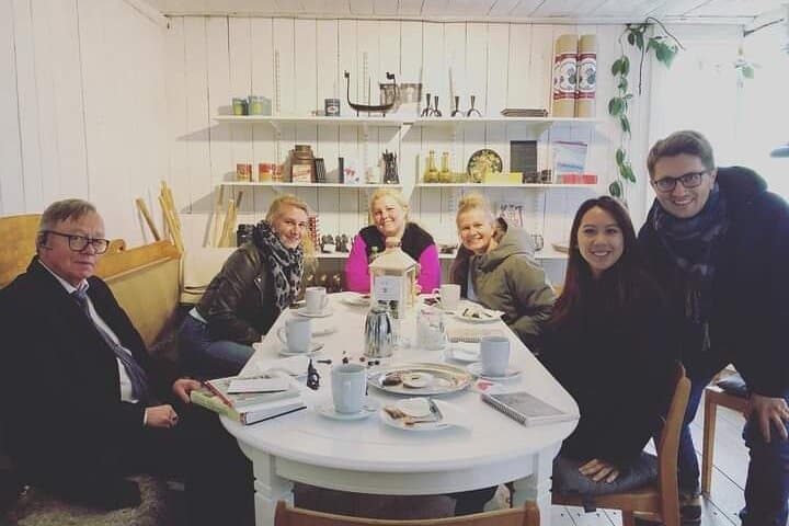 Tour guide with happy guest at Hökeriet, a farmhouse café at one of the Viking Tour stops. Most tours are small groups of less than 10 guests, the maximum allowed number is 16.