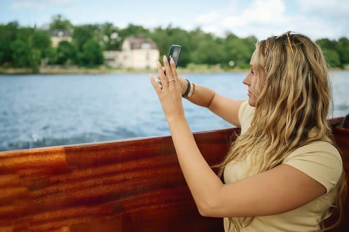 Sightseeing Ride Guest taking photos of Stockholm