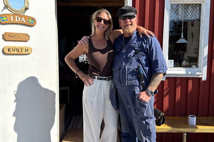 Local fisherman Martin showing our guests inside his families sea hut.