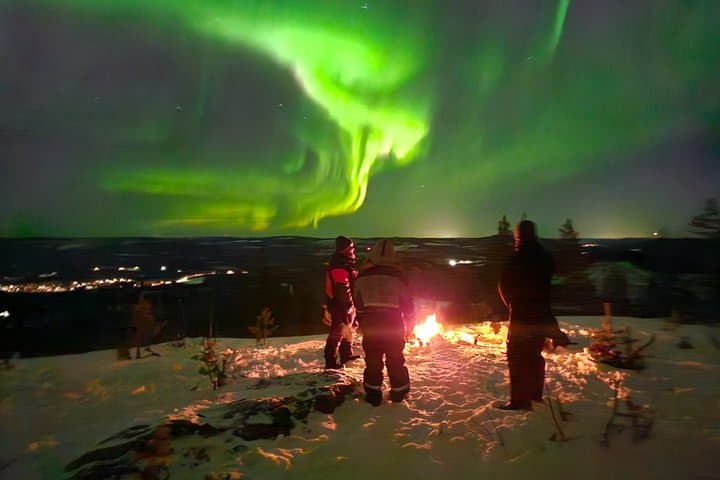 Hunt for the Northern Lights on Snowmobile