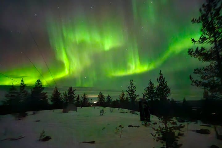 Hunt for the Northern Lights on Snowmobile