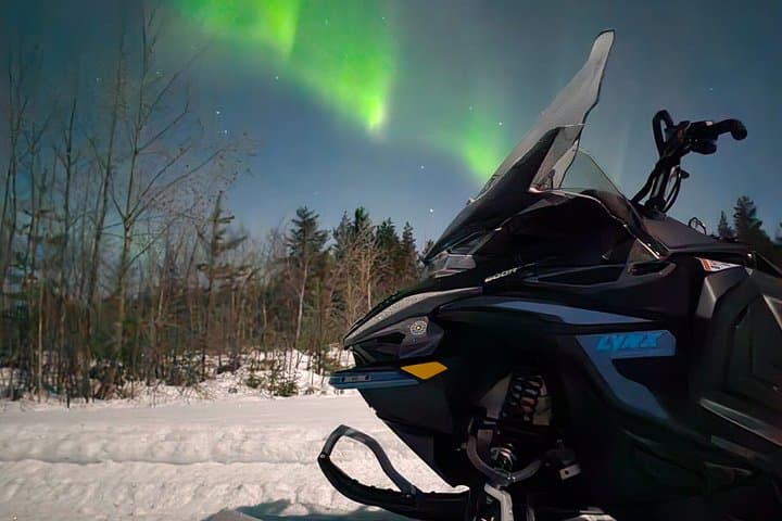 Hunt for the Northern Lights on Snowmobile